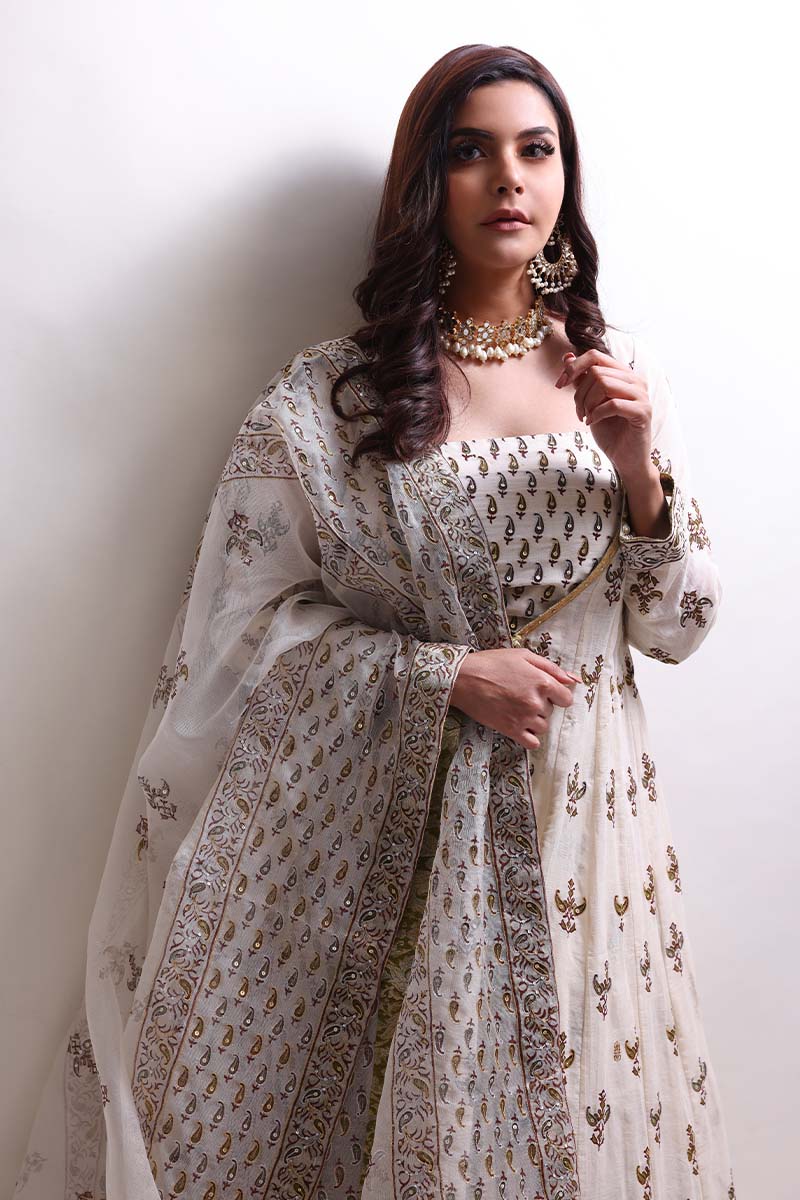 Off-white Angarkha set with tilla, sequins, and matching Dhaka & dupatta